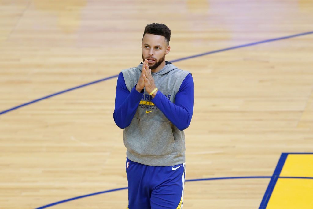 SAN FRANCISCO, CALIFORNIA - FEBRUARY 15: Stephen Curry #30 of the Golden State Warriors warms up before the game against the Cleveland Cavaliers at Chase Center on February 15, 2021 in San Francisco, California. NOTE TO USER: User expressly acknowledges and agrees that, by downloading and/or using this photograph, user is consenting to the terms and conditions of the Getty Images License Agreement. (Photo by Lachlan Cunningham/Getty Images)