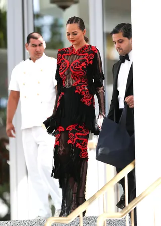 Chrissy Teigen - Chrissy Teigen turned heads as she left her Miami hotel to attend a friend's wedding in Miami. (Photo: Thibault Monnier, PacificCoastNews)