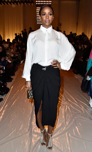 Sophisticated Chic - Kelly Rowland rocked this black and white number at the Lanvin show during Paris Fashion Week.(Photo: Pascal Le Segretain/Getty Images)