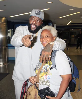All Laughs - Rick Ross joked around with the paparazzi at LAX while shopping at the Duty Free.(Photo: Sharky / Splash News)