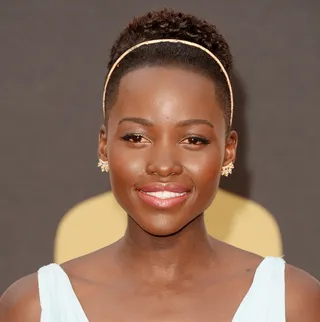 Accessorize - Need a quick fix for a blaze cut? A headband or bedazzled barrette will do the trick. Lupita shows us how to rock the trend right at the 86th Annual Academy Awards.  (Photo: Jason Merritt/Getty Images)