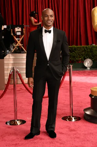 Tyson Beckford - The model puts his good looks to work in his sharp black suit and bow tie.(Photo: Frazer Harrison/Getty Images)