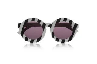 House of Holland Peggy Striped Round-Frame Acetate Sunglasses  - Lend a playful spin to every piece in your closet with House of Holland’s black-and-white stripe oversized Peggy shades.   (Photo: Net-a-Porter)