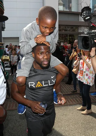 Father-Son Bonding - Kevin Hart gave his son Hendrix a piggy back ride at the HealthFest rally at The Grove.(Photo: Paul Archuleta/FilmMagic)