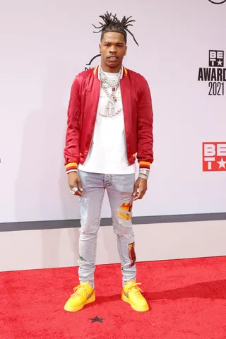 Lil Baby - Lil Baby kept things fresh in a crisp white Casablanca t-shirt and red jacket paired with Amiri jeans.&nbsp; (Photo by Amy Sussman/FilmMagic)
