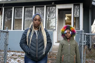 Philando Castile's partner Diamond Reynolds stands next to her daughter. - (Photo: Lara Solanki/BET)&nbsp;