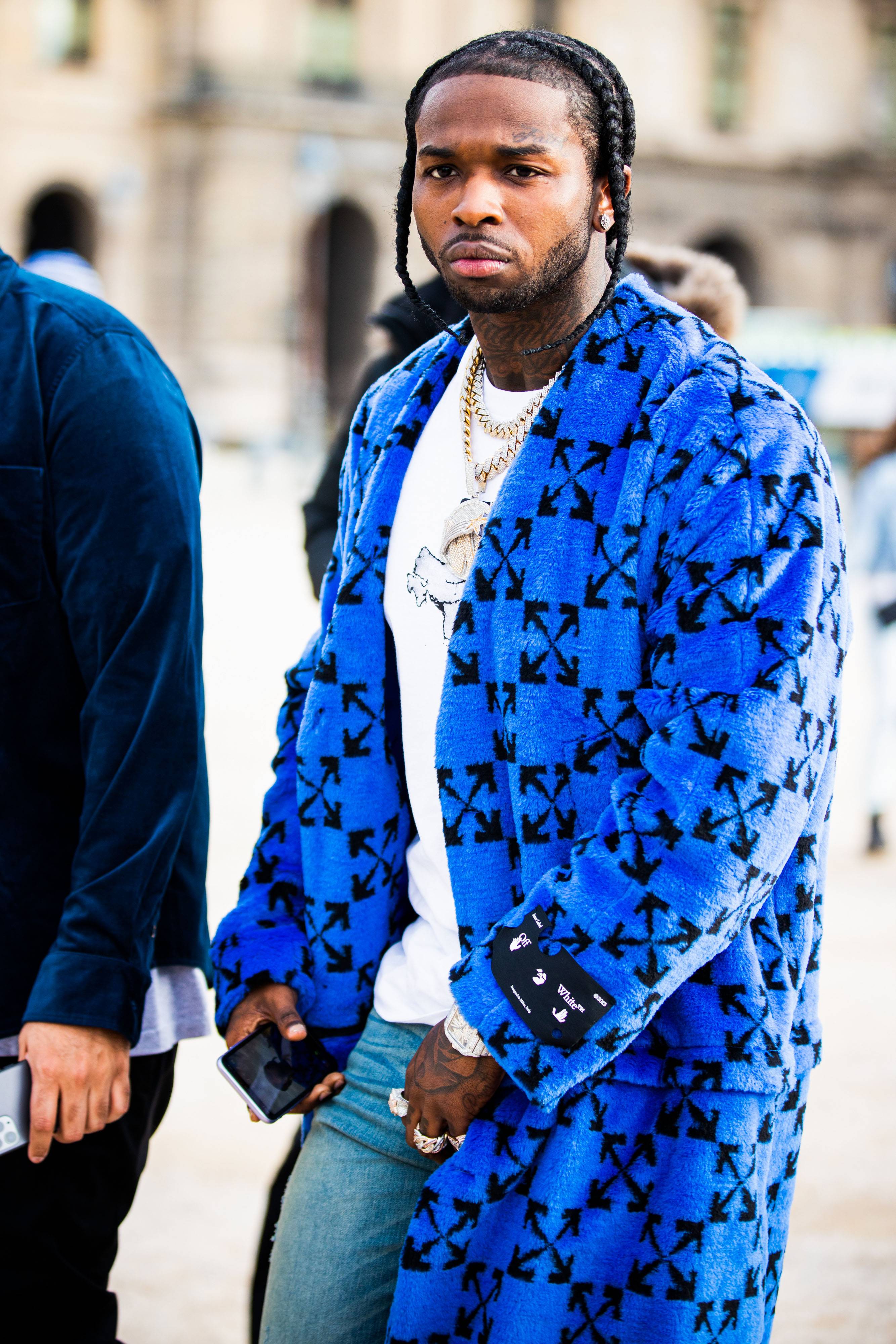 PARIS, FRANCE - JANUARY 15: Rapper Pop Smoke attend the Off-White Menswear Fall/Winter 2020-2021 show as part of Paris Fashion Week on January 15, 2020 in Paris, France. (Photo by Claudio Lavenia/Getty Images)