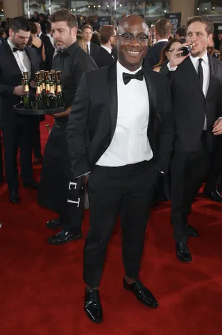 Barry Jenkins - Barry looks chic wearing a black tuxedo by Dior.&nbsp; (Photo: Joe Scarnici/Getty Images for Moet & Chandon)