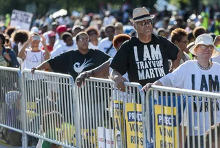 Justice for Trayvon Martin&nbsp; - Individuals wore shirts reading &quot;I AM Trayvon Martin&quot; in support of the 17-year-old teenager who was shot and killed by George Zimmerman in February 2012. The family of Trayvon and Emmett Till were both present and made remarks during the event. (Photo: Pete Marovich/Getty Images)