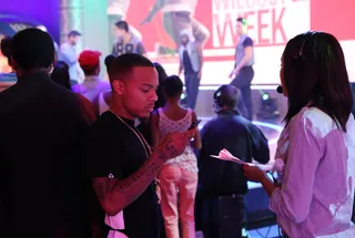 Stay in Check - Host Bow Wow stays social while he has a little down time.&nbsp;(Photo: Bennett Raglin/BET/Getty Images for BET)