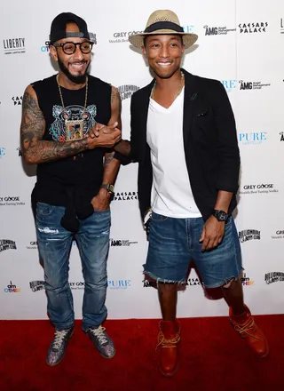 Cheers - Swizz Beatz and Pharrell Williams arrive at Pure Nightclub at Caesars Palace in Las Vegas to celebrate the 10th anniversary of Williams' Billionaire Boys Club clothing line.(Photo: Ethan Miller/Getty Images)