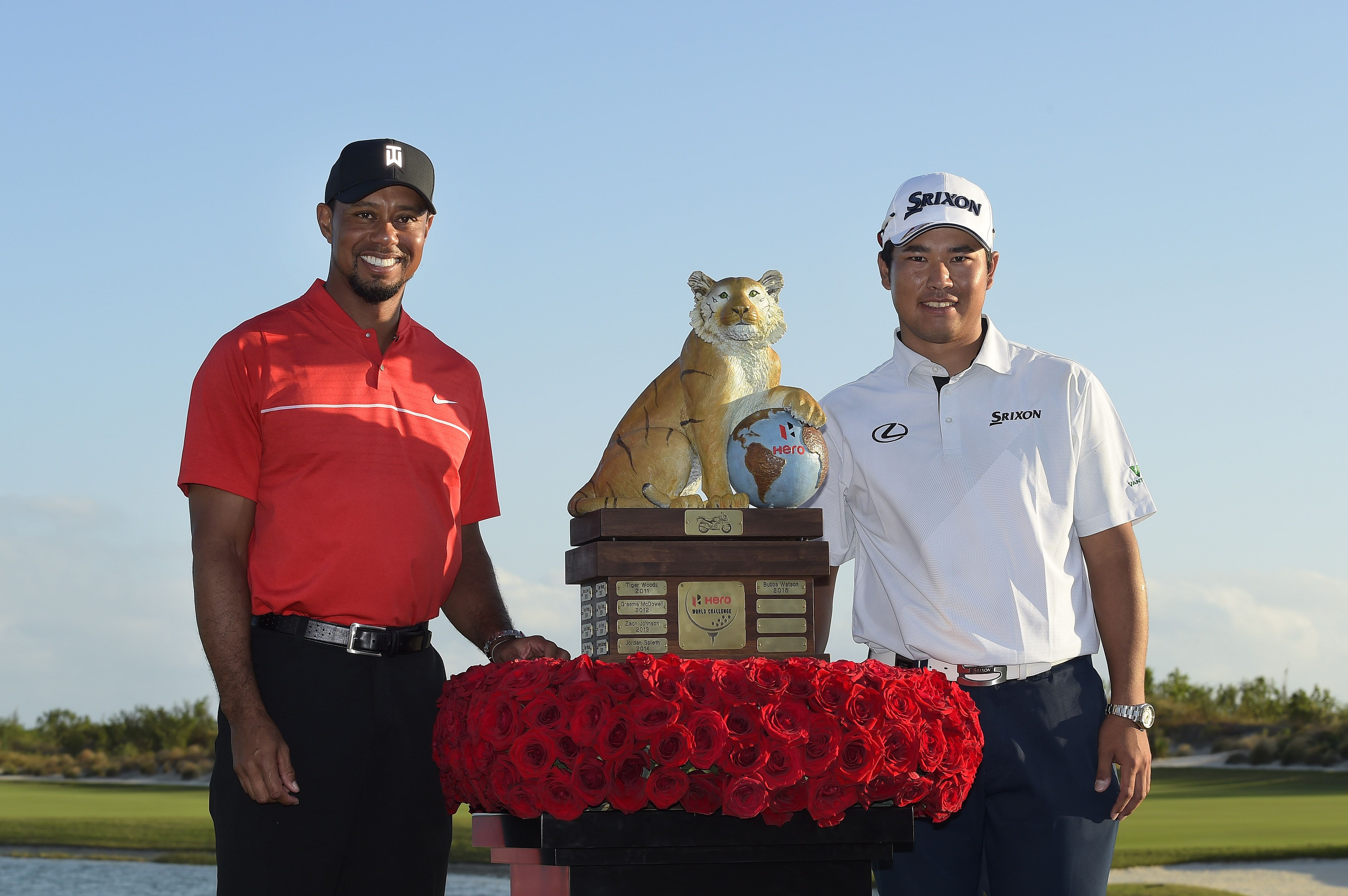 NASSAU, BAHAMAS - DECEMBER 04: (L-R) Tournament host Tiger Woods and Hideki Matsuyama of Japan poses with the winner's trophy during the Hero World Challenge at Albany course on December 4, 2016 in Nassau, Bahamas. (Photo by Stan Badz/PGA TOUR)