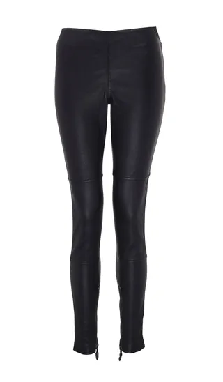 Leather Trousers - Upgrade your black tights situation with a luxurious leather version perfect for slipping under dresses with boots or wearing alone with an oversized sweater or button-down blouse.  (Photo: River Island Winter Collection)
