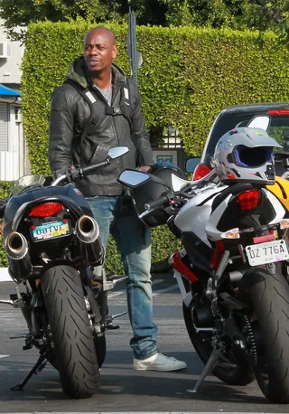 Revin' Up - Dave Chappelle takes his motorcycle out for a ride to the trendy West Coast boutique Fred Segal in West Hollywood to meet with friends.&nbsp;(Photo:&nbsp; JLM / Splash News)