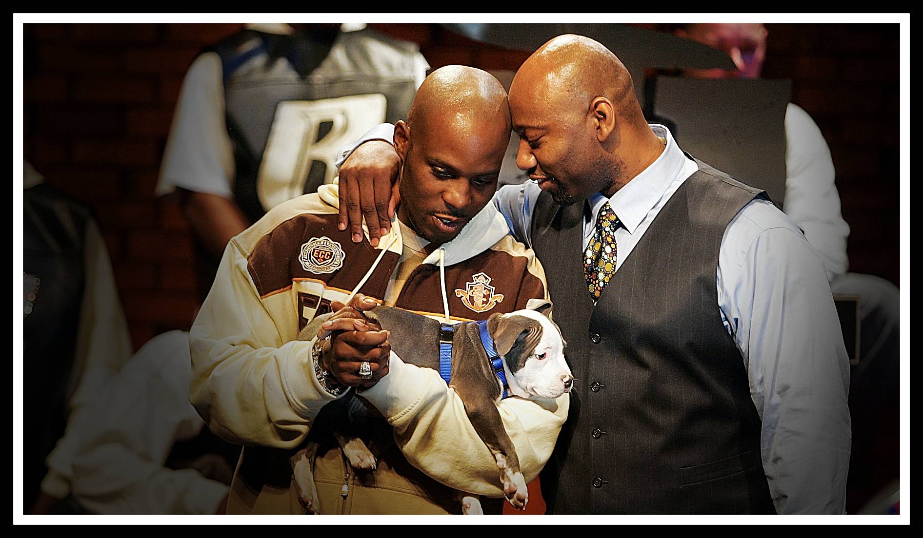 Rapper DMX (left), whose real name is Earl Simmons, and Ruff Ryders Co-founder and CEO Joaquin "Waah" Dean get together during a news conference at Sony Urban Music's studios on W. 53rd St. DMX announced he is returning to the Sony Urban label after several years with Def Jam and is also reuniting with his group, the Ruff Ryders 
