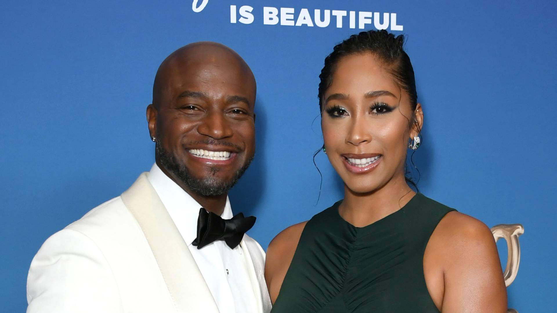 Taye Diggs (L) and Apryl Jones attend TheGrio Awards 2022 at The Beverly Hilton on October 22, 2022 in Beverly Hills, California. 