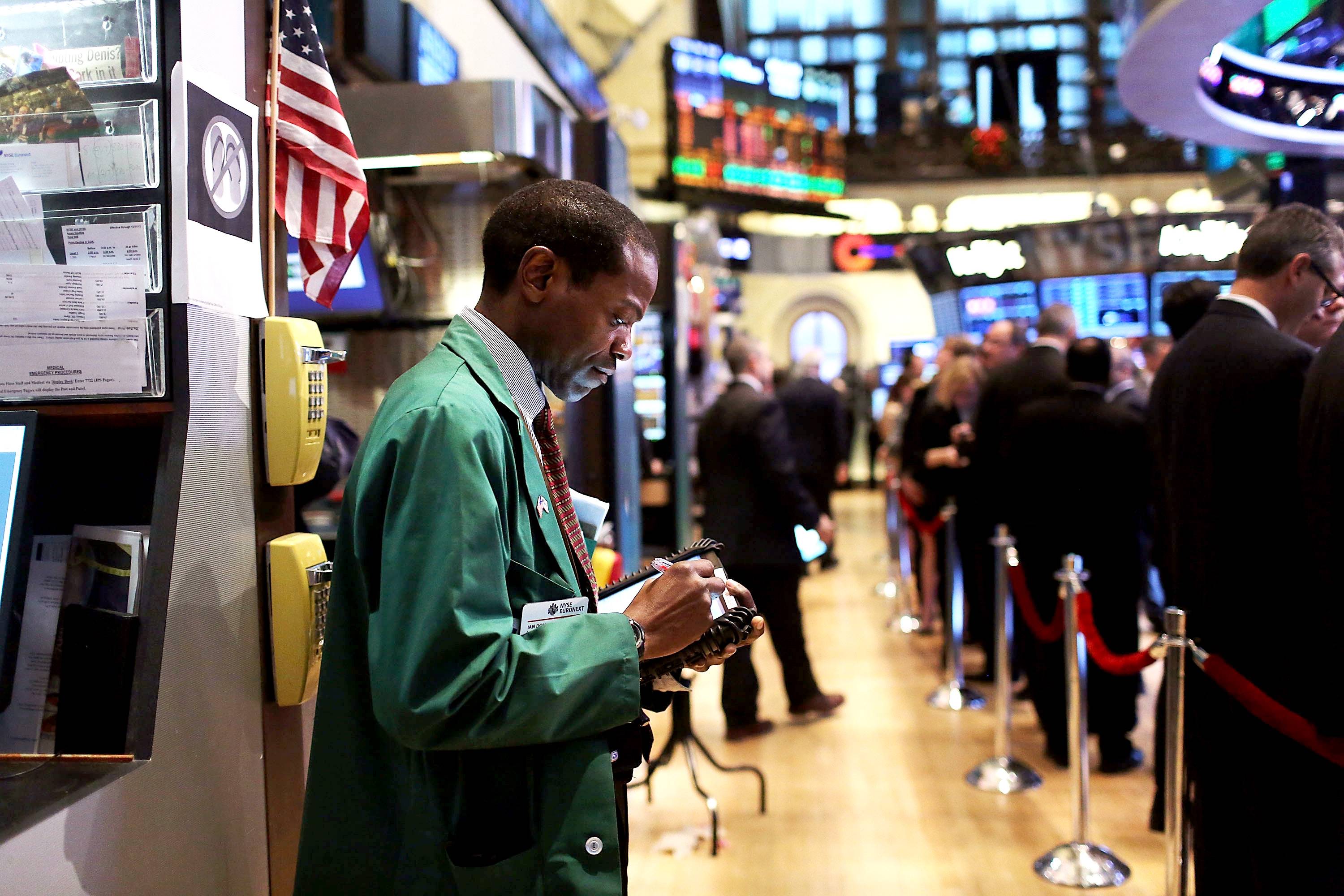 A trader works on the floor of the New York Stock Exchange