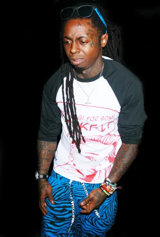 /content/dam/betcom/images/2012/12/Music-12-16-12-31/122112-music-lil-wayne.jpg