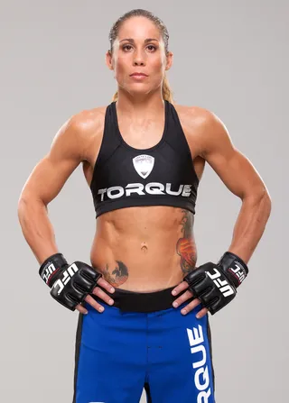 Liz Carmouche - Liz Carmouche is a mixed martial arts fighter who has a record of nine wins and three losses and is the No. 6 ranked woman in her weight class. She is also openly lesbian.(Photo: Jim Kemper/Zuffa LLC/Zuffa LLC via Getty Images)