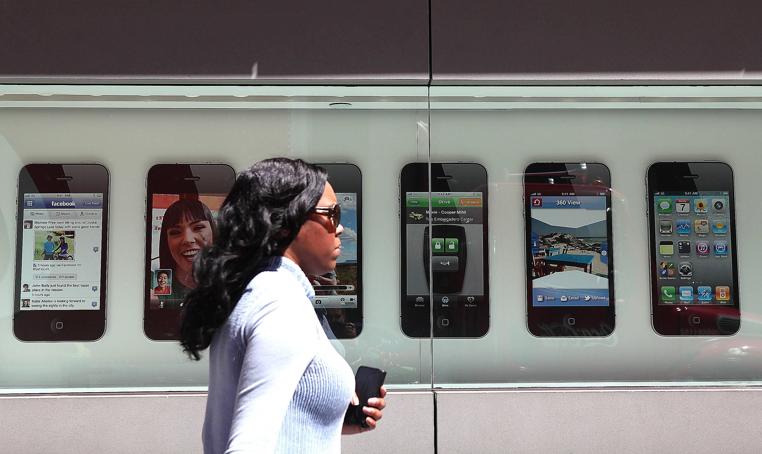 iPhone\r - The introduction of the iPhone helped boost the company's increased popularity and dominence. Upon the introduction of the phones, people waited in long lines across the country just to own one.\r(Photo: Justin Sullivan/Getty Images)