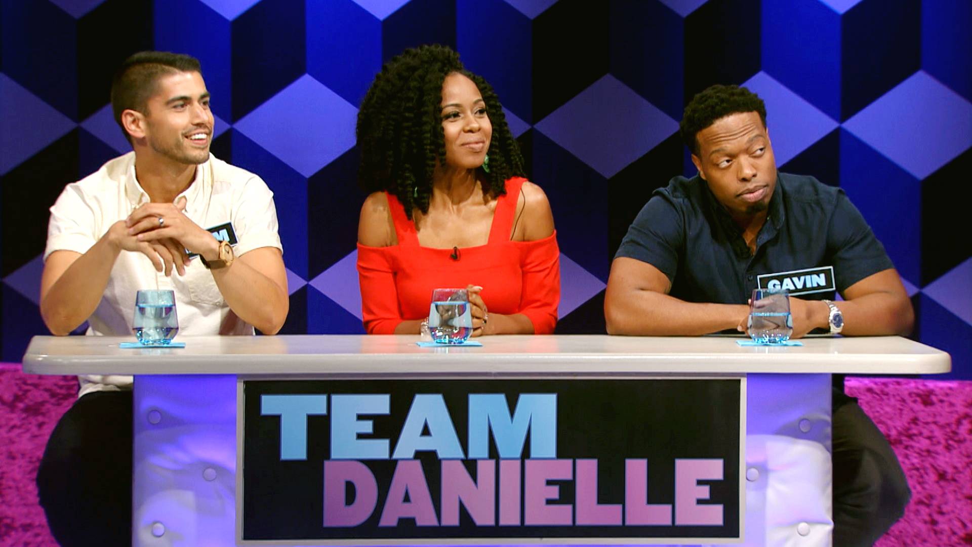 Actor Danielle Truit and her team on episode 108 of BET's New game show Face Value.