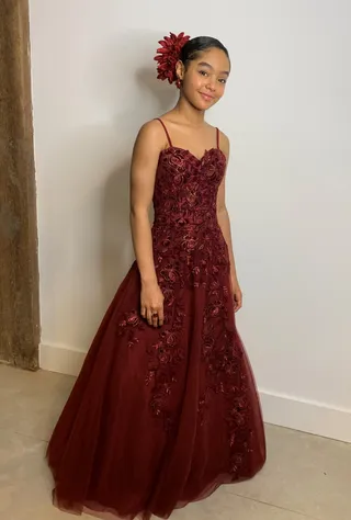 Madalen Mills looked too adorable in her floral evening gown. - (Photo by Jamie Mills/via Getty Images)