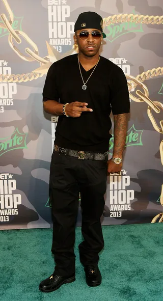 Rocko - ATL's own Rocko goes all black on the all-green carpet.&nbsp;(Photo: Bennett Raglin/BET/Getty Images for BET)