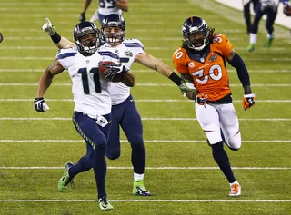 The Comeback King - After only 37 snaps all season due a hip injury receiver Percy Harvin had one of the best highlights of the game. He returned the opening kickoff of the second half 87 yards for a touchdown and a 29-0 lead.(Photo: Tom Pennington/Getty Images)