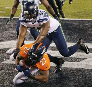 Broncos on the Board - Peyton Manning hit Demaryius Thomas with a 14-yard touchdown pass late in the third quarter and Denver finally broke through on the scoreboard. The Broncos' TD and subsequent 2-point conversion pass to Wes Welker made the score 36-8 heading into the fourth quarter.(Photo: Christian Petersen/Getty Images)