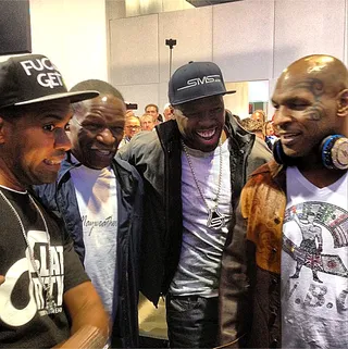 50 Cent @50Cent - Although the Money Team may have disasembled last year Fif's still in good graces with one Mayweather — Floyd Sr. Mike Tyson and DJ Whoo Kid round out the laughing foursome at a function in Las Vegas. (Photo: Instagram via 50cent)