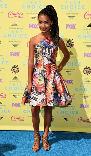 Yara Shahidi - We're officially on style-watch when it comes to this Black-ish star! Yara keeps it fresh in a floral mixed-print cocktail frock and strappy nude shoes.  (Photo: Jason Merritt/Getty Images)