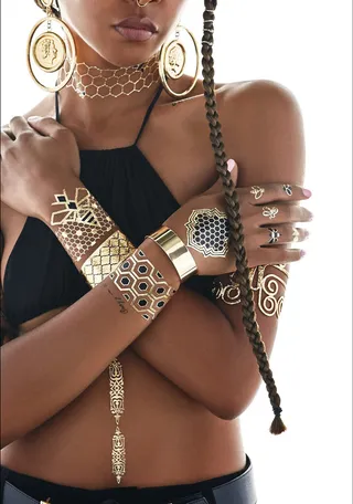 Bumble with the Bey - These honeycomb cutouts are a sweet accent to any jeans or LBD.(Photo: Erik Ian courtesy of Flash Tattoos)