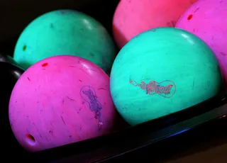 Midnight Bowling - There’s something about bowling under the glow of a black light that just makes it ridiculously fun. Check with your local bowling alley to see if they hold bowling nights during prom weekend. No glow-in-the-dark offerings? Go during daylight hours and turn it into a competition. Did someone say “prizes”?&nbsp; (Photo: Paul S. Howell/Getty Images)