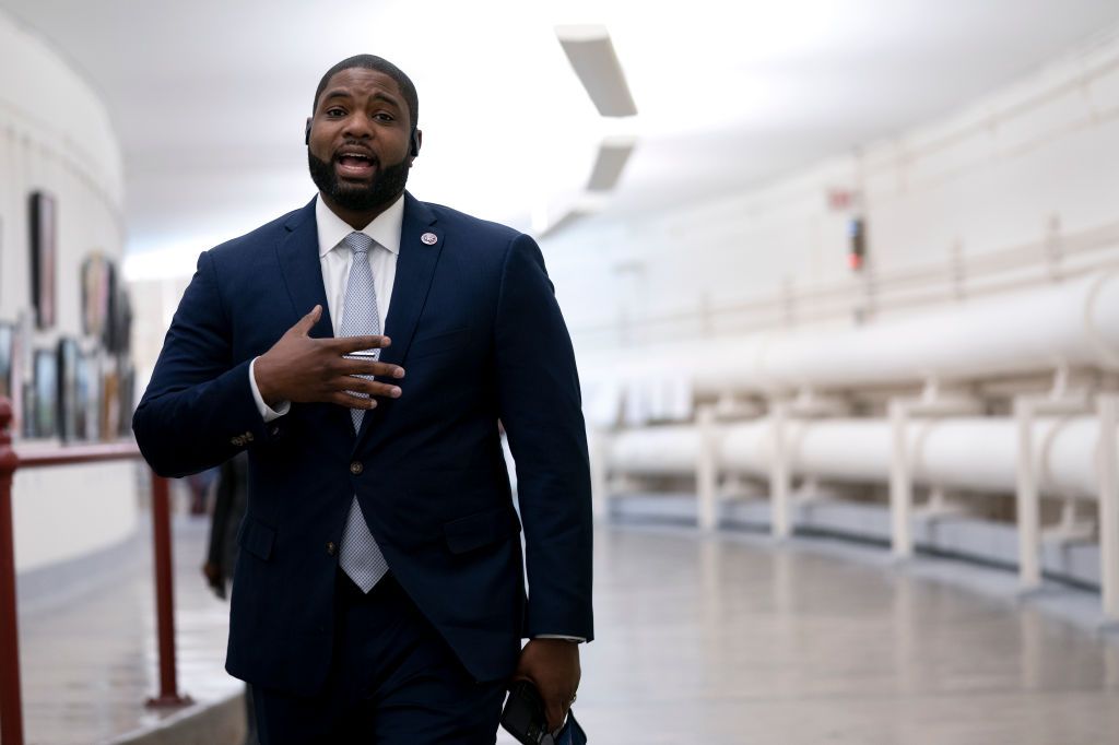 WASHINGTON, DC - JANUARY 12: Rep. Byron Donalds (R-FL) speaks while walking through the Canon Tunnel to the U.S. Capitol on January 12, 2021 in Washington, DC. Today the House of Representatives plans to vote on Rep. Jamie Raskin's (D-MD) resolution calling on Vice President Mike Pence to invoke the 25th Amendment, removing President Trump from office. On Wednesday, House Democrats plan on voting on articles of impeachment. (Photo by Stefani Reynolds/Getty Images)
