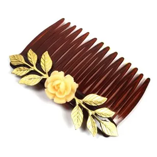 Hannah Zakari Persephone Hair Comb - Slide a rose adorned hair comb into your strands for an instant dose of glam.&nbsp;  (Photo: Courtesy of Hannah Zakari)