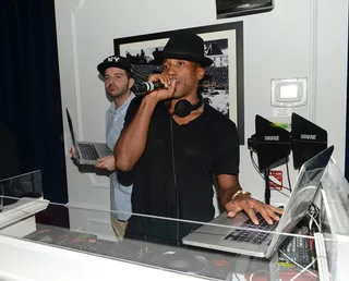 Ones and Twos - Q-Tip rocks the party from the DJ booth for his homie Nas. (Photo: Andrew H. Walker/Getty Images for Moet Rose)