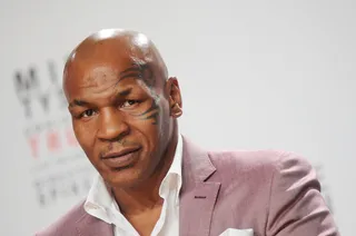 Mike Tyson on the taste of Evander Holyfield’s ear:&nbsp; - “It wasn’t too tasty… I didn’t have any of that Holyfield hot sauce on it. That would have been a delicacy.” (Photo: Landov)