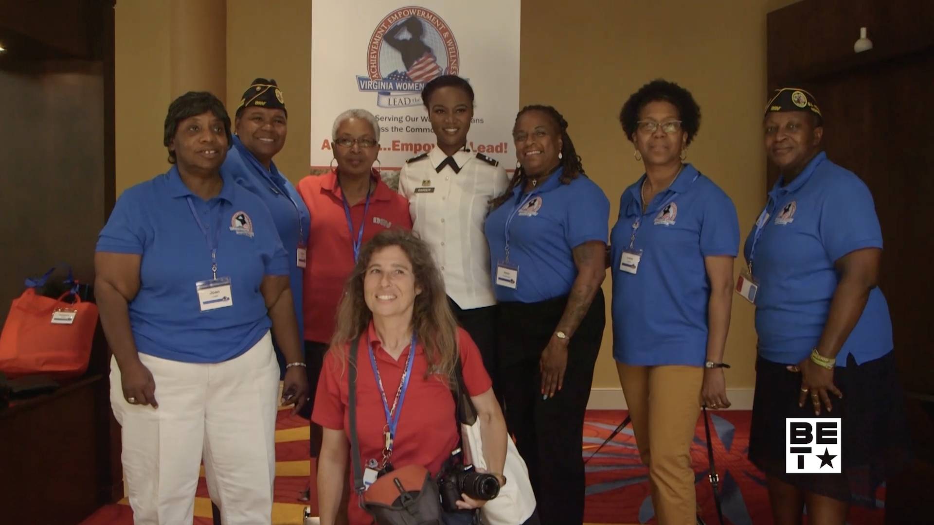 Former Miss USA and U.S. Army Reserve member Deshauna Barber taking a picture with Veterans.