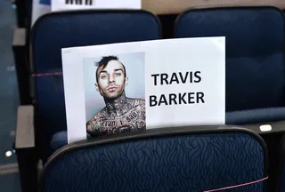 Is Your Bite Louder Than Your Bark ? - Travis Barker’s tattoos and amazing drumming abilities will definitely prove that his bold appearance is all that it's cracked up to be.  (Photo: Kevin Winter/Getty Images for BET)