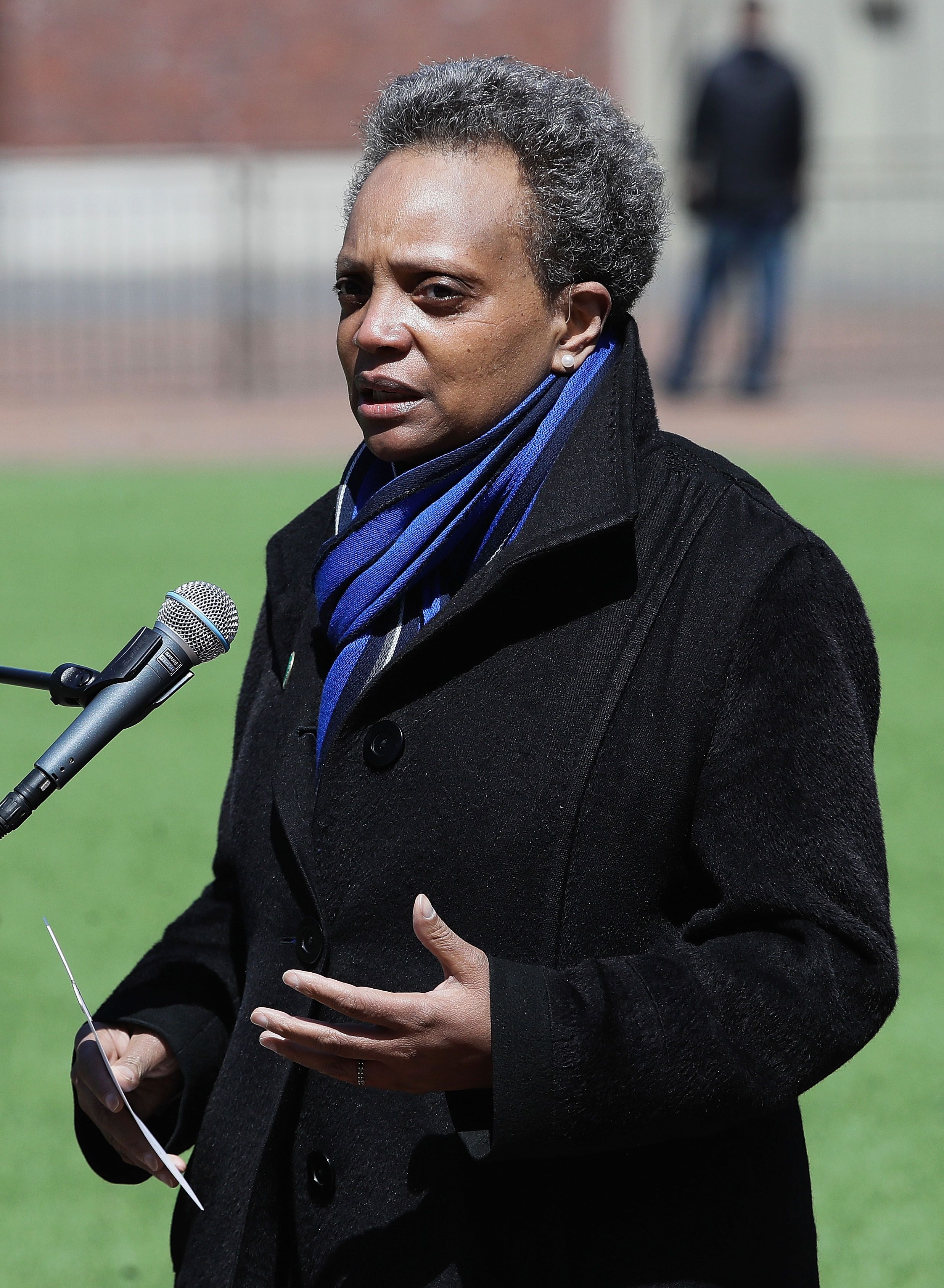 CHICAGO, ILLINOIS - APRIL 16: Chicago mayor Lori Lightfoot speaks during a press outside of Wrigley Field on April 16, 2020 in Chicago Illinois. Wrigley Field has been converted to a temporary satellite food packing and distribution center in cooperation with the Lakeville Food Pantry to support ongoing relief efforts underway in the city as a result of the COVID-19 pandemic. (Photo by Jonathan Daniel/Getty Images)