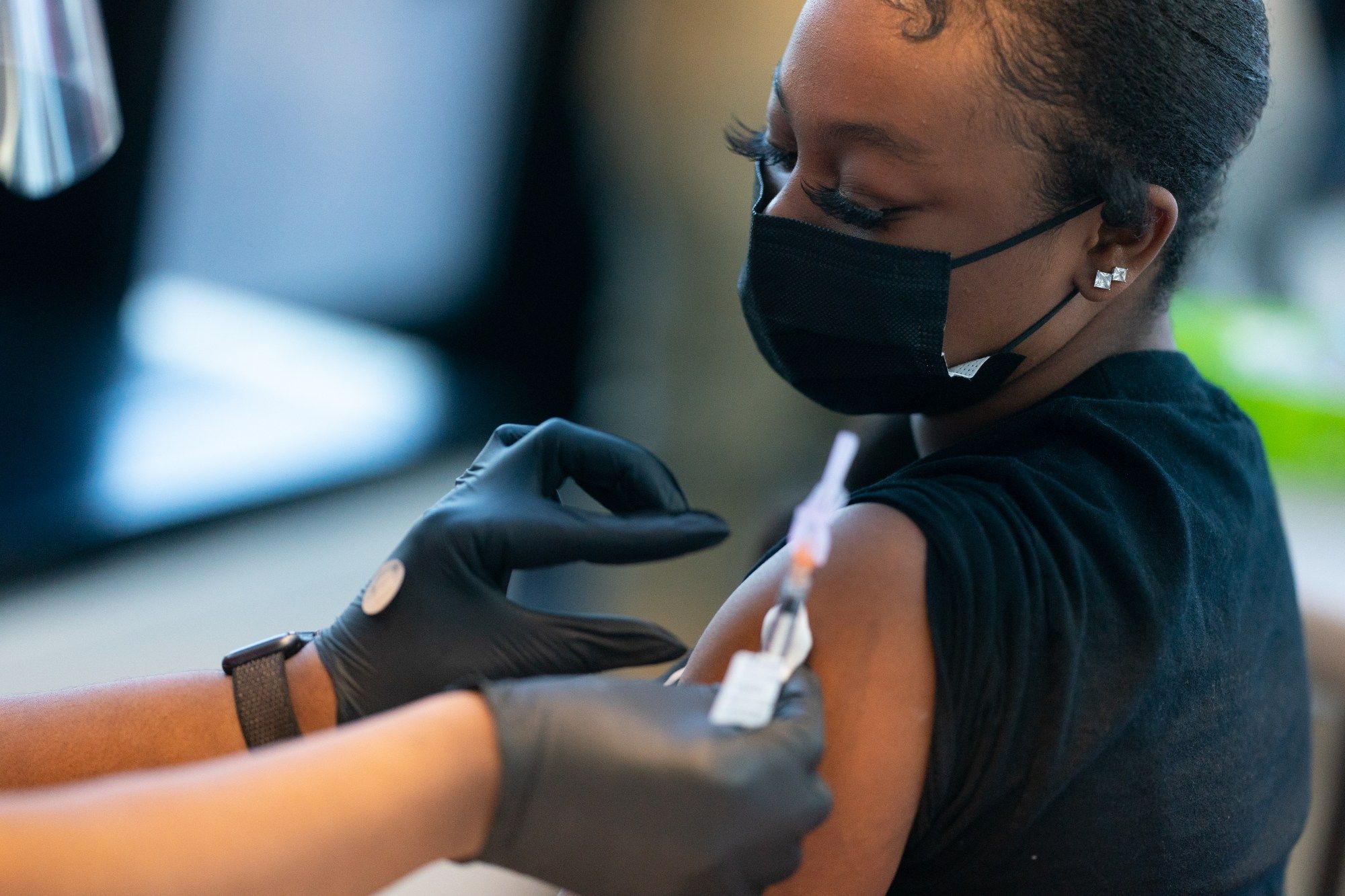 Washington, DC - May 13: 15, Kymberly Vandergrift, 15, of DC, receives the vaccine. Children's National Hospital gave the COVID-19 vaccine to its first batch of 12-15 year old children Thursday morning, May 13, 2021. (Photo by Sarah L. Voisin/The Washington Post)