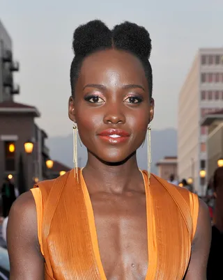 Lupita's Poufs  - We didn’t know pigtail poufs were possible until we spied them on Lupita at the NAACP Image Awards and instantly fell in love.  (Photo:&nbsp;Frederick M. Brown/Getty Images for NAACP Image Awards)