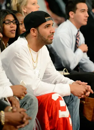 Shoot for Me - Drake is on the edge of his seat watching the Skills Contest at the State Farm All-Star Saturday Night during the NBA All-Star Weekend in New Orleans. (Photo: Kevin Mazur/WireImage)