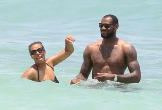 Beach Date  - The couple that plays together stays together. LeBron and his ladylove have a little fun in the sun at the Atlantis Resort in the Bahamas.(Photo: Splash News)&nbsp;