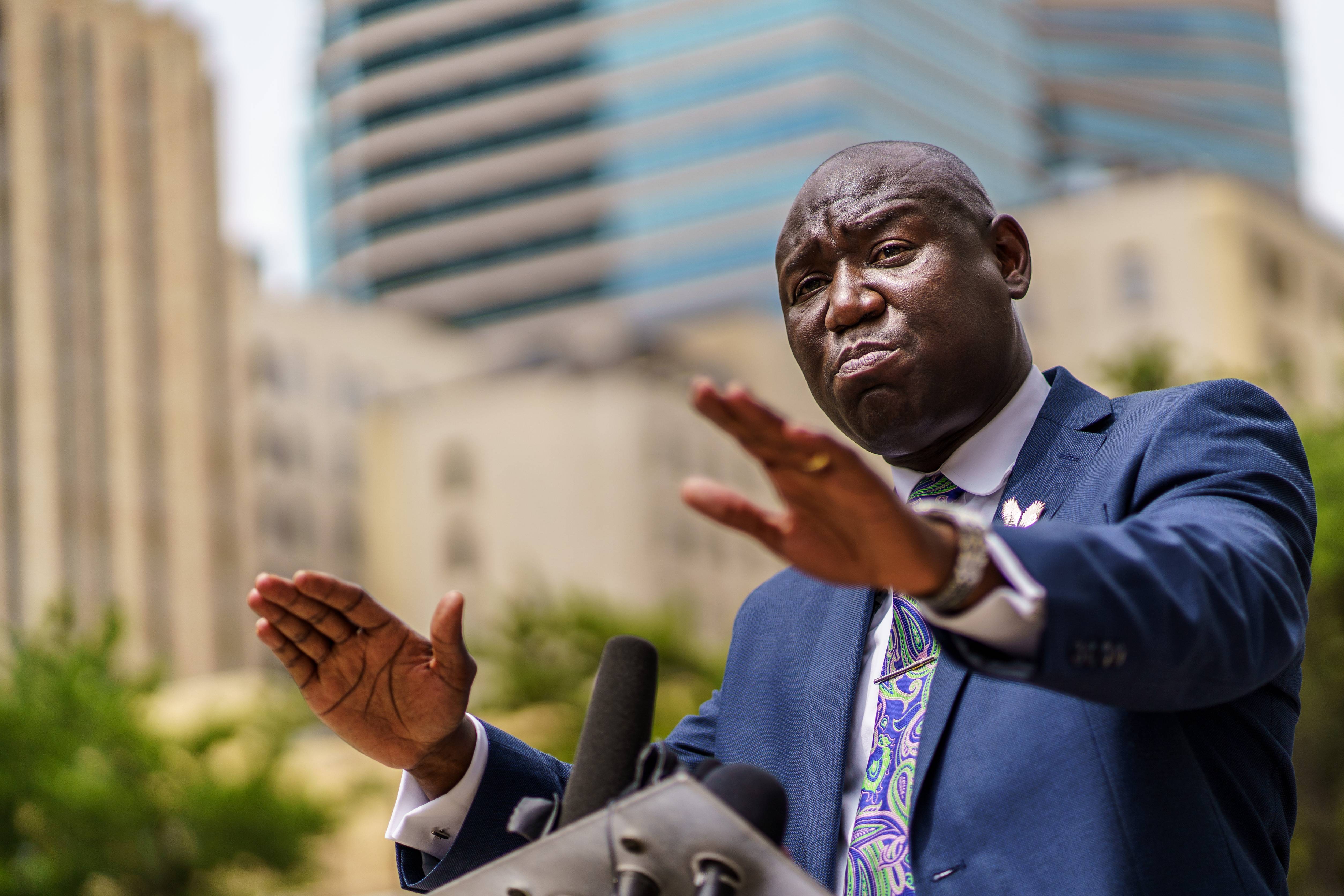 Attorney Ben Crump speaks at a press conference outside the federal courthouse on July 15, 2020, in Minneapolis, Minnesota. - Crump announced he is filing a civil lawsuit against the city of Minneapolis and police officers, on behalf of the family of George Floyd. (Photo by Kerem Yucel / AFP) (Photo by KEREM YUCEL/AFP via Getty Images)