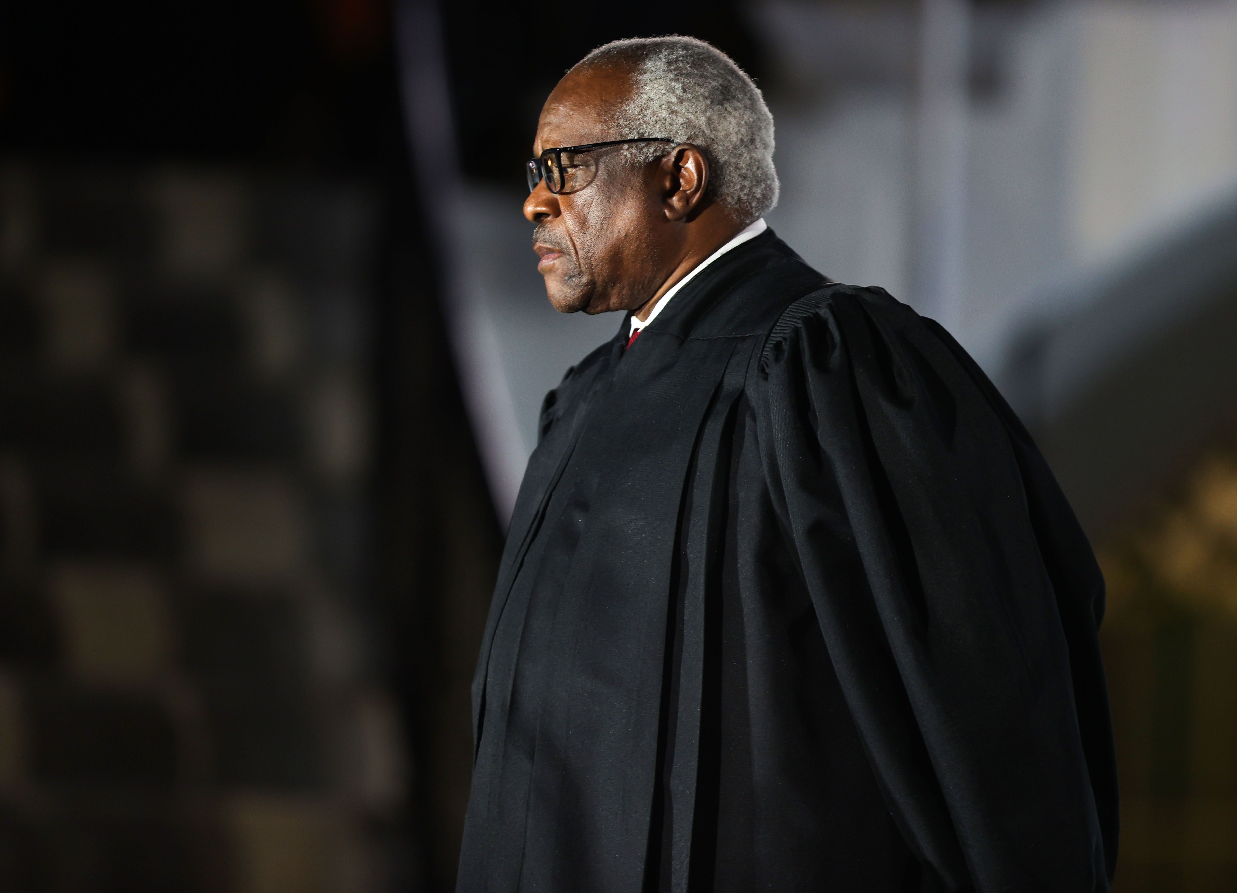 WASHINGTON, DC - OCTOBER 26: Supreme Court Associate Justice Clarence Thomas attends the ceremonial swearing-in ceremony for Amy Coney Barrett to be the U.S. Supreme Court Associate Justice on the South Lawn of the White House October 26, 2020 in Washington, DC. The Senate confirmed Barrett’s nomination to the Supreme Court today by a vote of 52-48. (Photo by Tasos Katopodis/Getty Images)