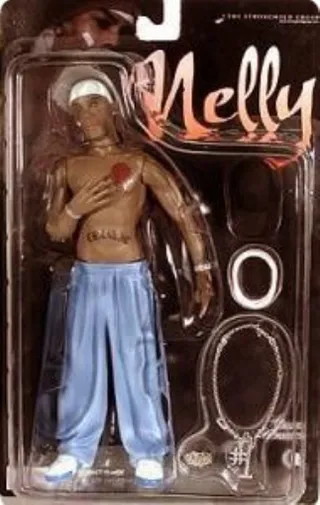 Nelly - Nelly dropped his dirty doll during the height of his Country Grammar era and it featured his former signature band-aid across his face and &quot;Lunatic&quot; tattoo across his stomach.(Photo: Stronghold Group)