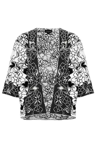 TopShop - Need to dress up a drab dress or boring top? Cover up in this embroidered kimono from TopShop and look chic in a cinch.  (Photo: TopShop)