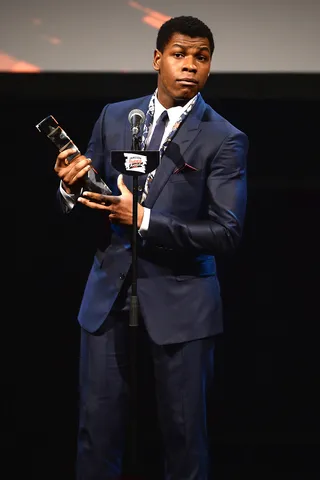 Draped - John Boyega looked dapper as usual as he accepted the award for Best Male Newcomer during the Jameson Empire Awards 2016 in London.(Photo: Jeff Spicer/Getty Images)