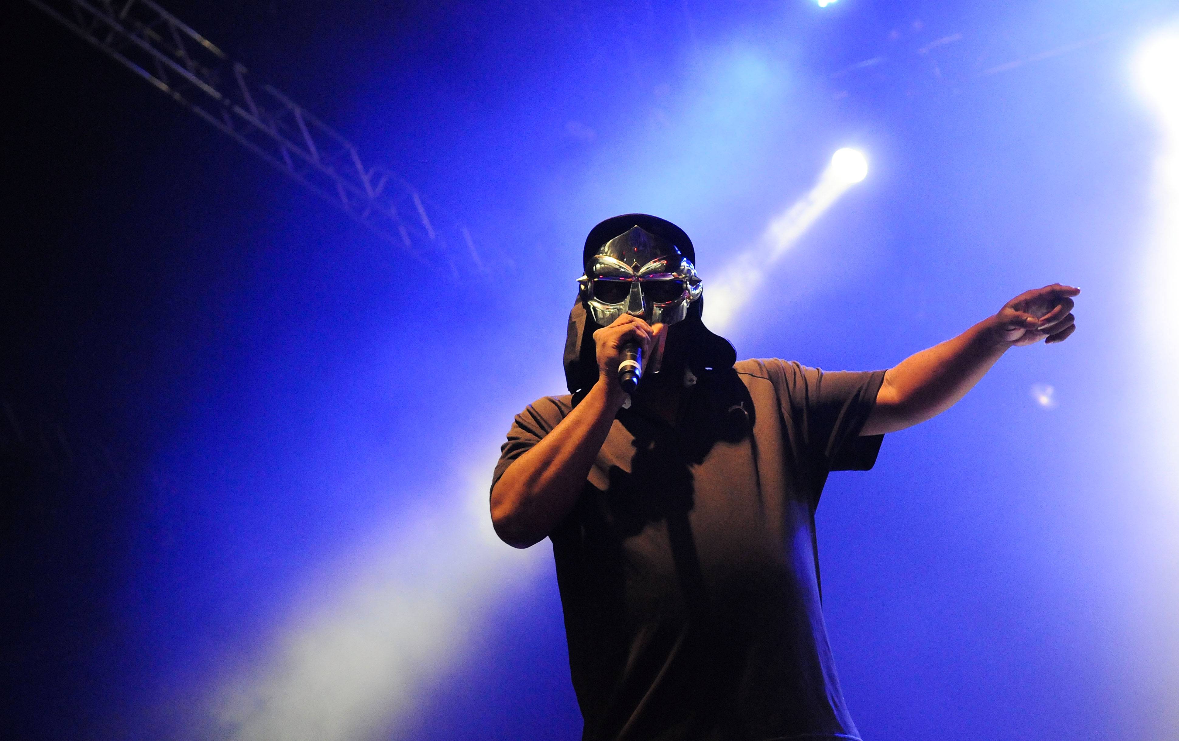 LONDON, ENGLAND - JULY 23:  Rapper MF Doom performs live on stage during the first day of the 'I'll Be Your Mirror' festival, curated By Portishead & ATP, at Alexandra Palace on July 23, 2011 in London, United Kingdom.  (Photo by Jim Dyson/Redferns)